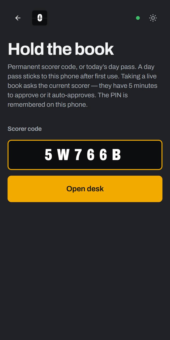 A second phone opens the scorer desk with the club's scorer code.